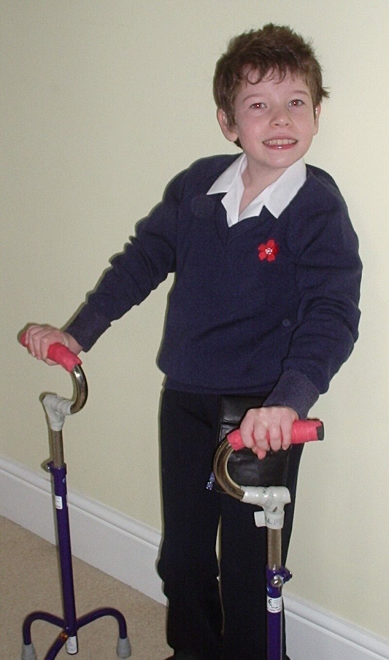 Beth Moulam with cerebral palsy using tripod walking sticks