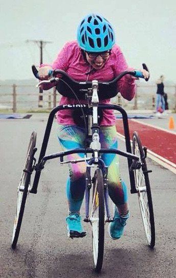 Beth Moulam, cerebral palsy, woman on RaceRunner, FrameRunning, running on athletics track