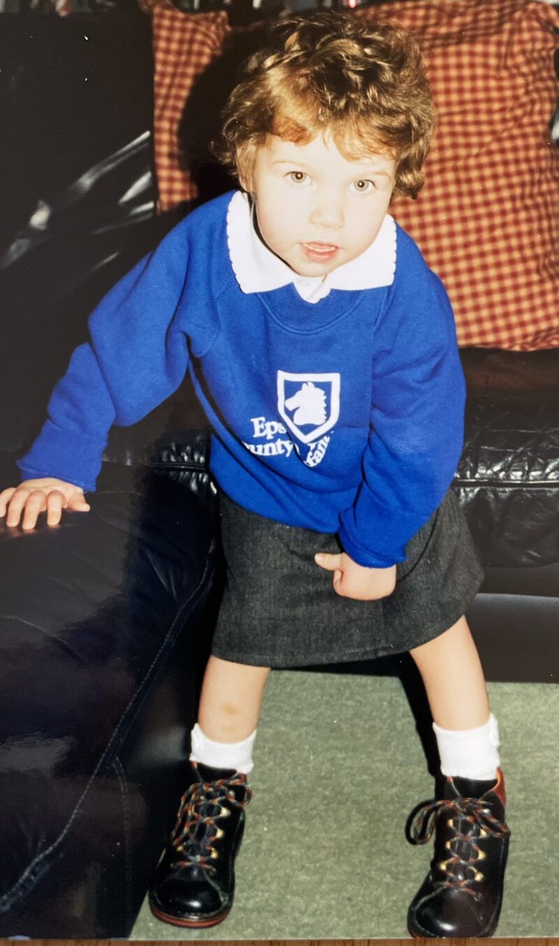 Beth Moulam with cerebral palsy, wearing school uniform, first day at school, lifelong learning