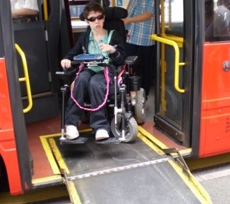 Beth Moulam, AAC, Power chair on bus