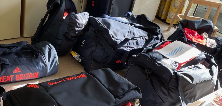 Open bags and suitcases in navy blue with Great Britain logos