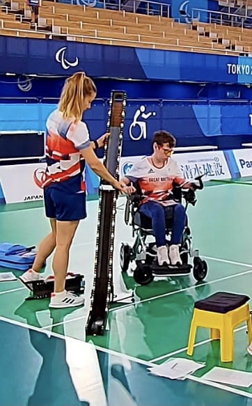 Beth Moulam Boccia athlete at Tokyo 2020 with sports as on courtsistant checking out balls