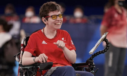 Beth Moulam, female with CP, BC3 boccia athlete. Wearing red GB sports kit