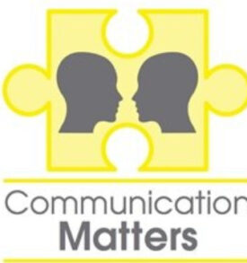 Communication Matters International conference. Yellow jigsaw piece with two heads facing each other communicating